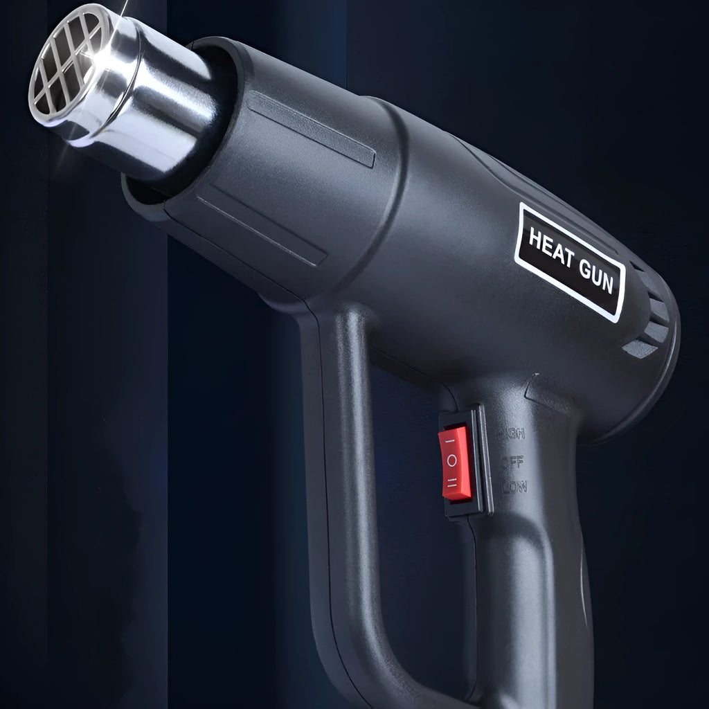 Black industrial 2000W hot air gun with grid air outlet and two-gear switch for temperature control.