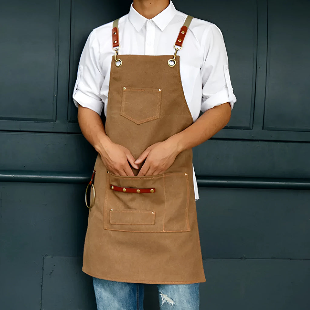 Canvas apron with cross back straps in camel colour