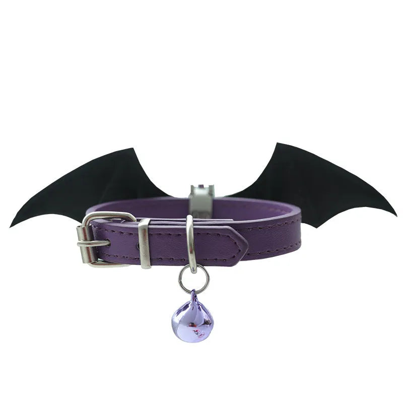 Small dog collar with devil wings and bell detail in patent leather satin material