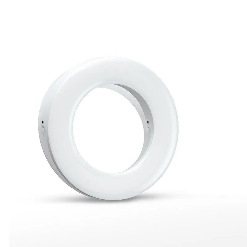 Compact black LED selfie ring light with USB cable for mobile phone photography.