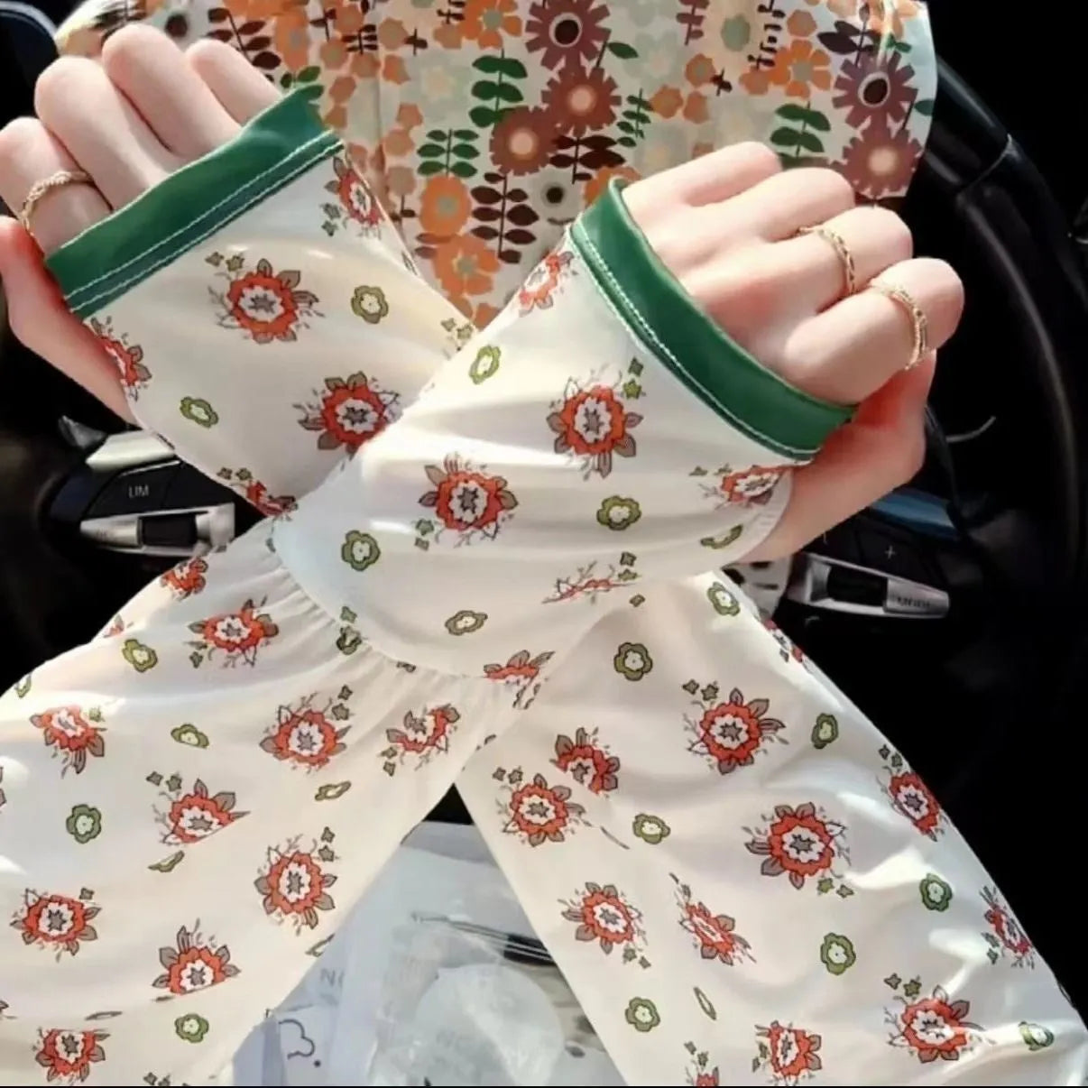 Printed ice silk UV protection oversleeves in floral fireworks leaf patterns with free size fit