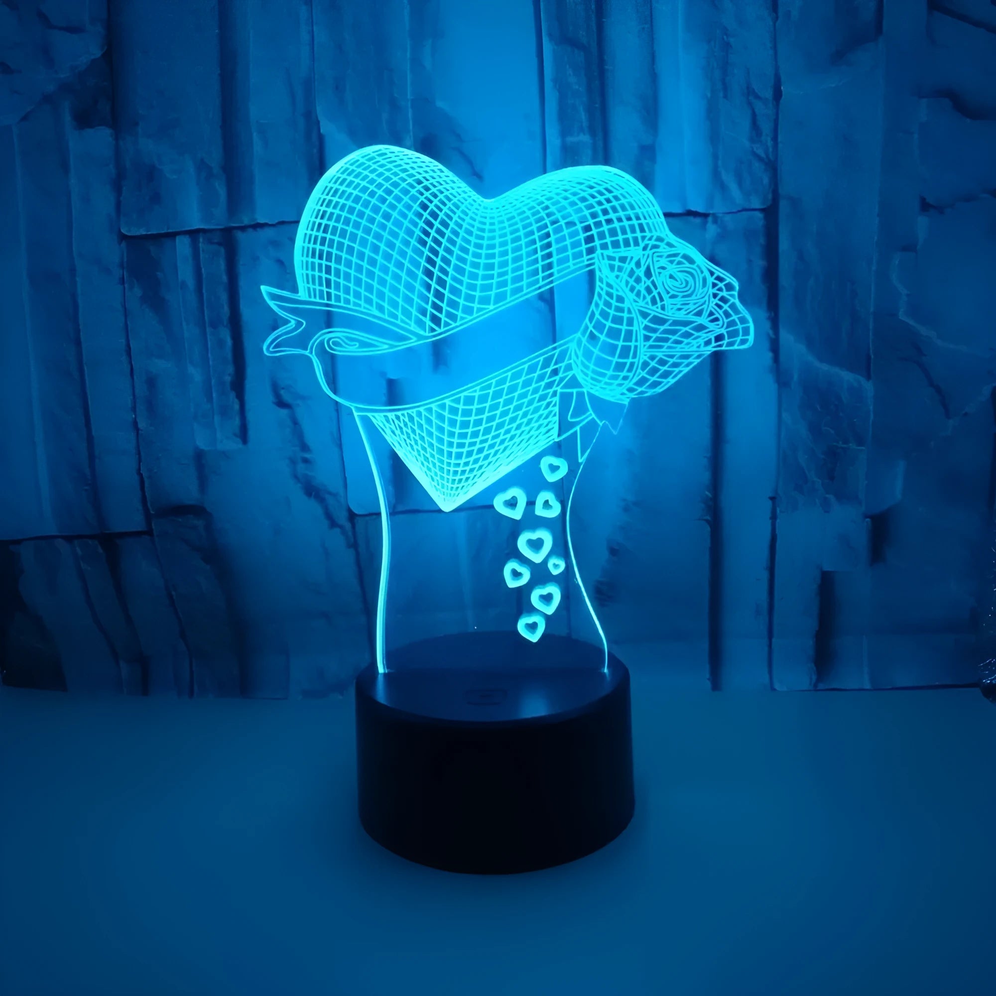 Black 3D night light with acrylic board and ABS base showing colourful gradient mode