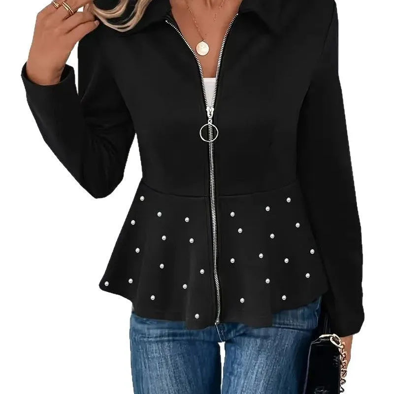 Women's black coat with heavy-duty zipper and ruffled hem in loose fit design
