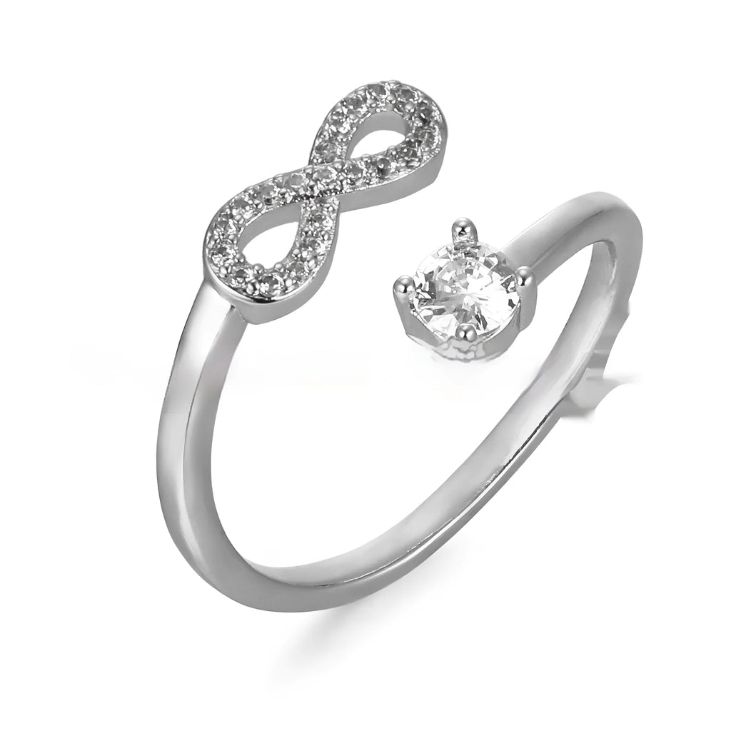 Geometric personality ring with engraved letter and inlaid zircon stones in metallic finish