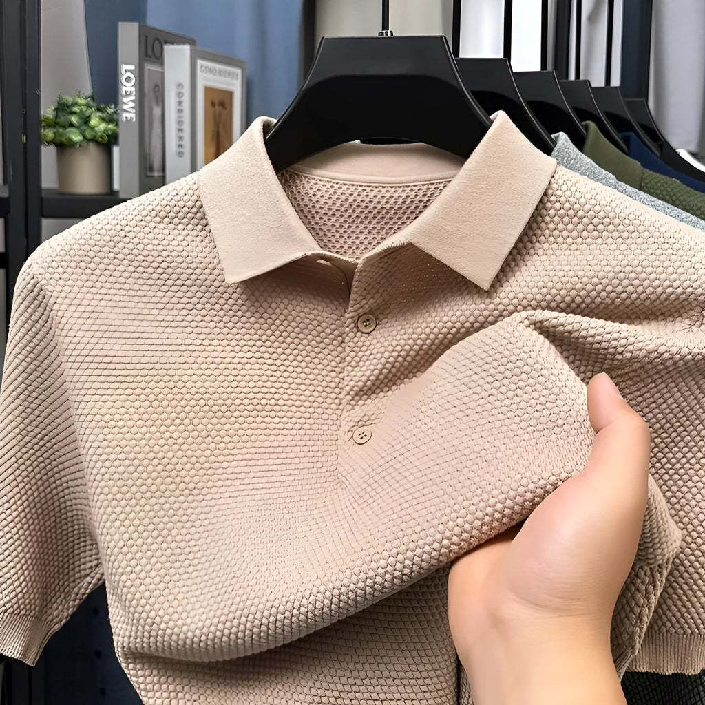 Loose fit pure cotton short sleeve pullover sweater shown in various colours including grey and navy.