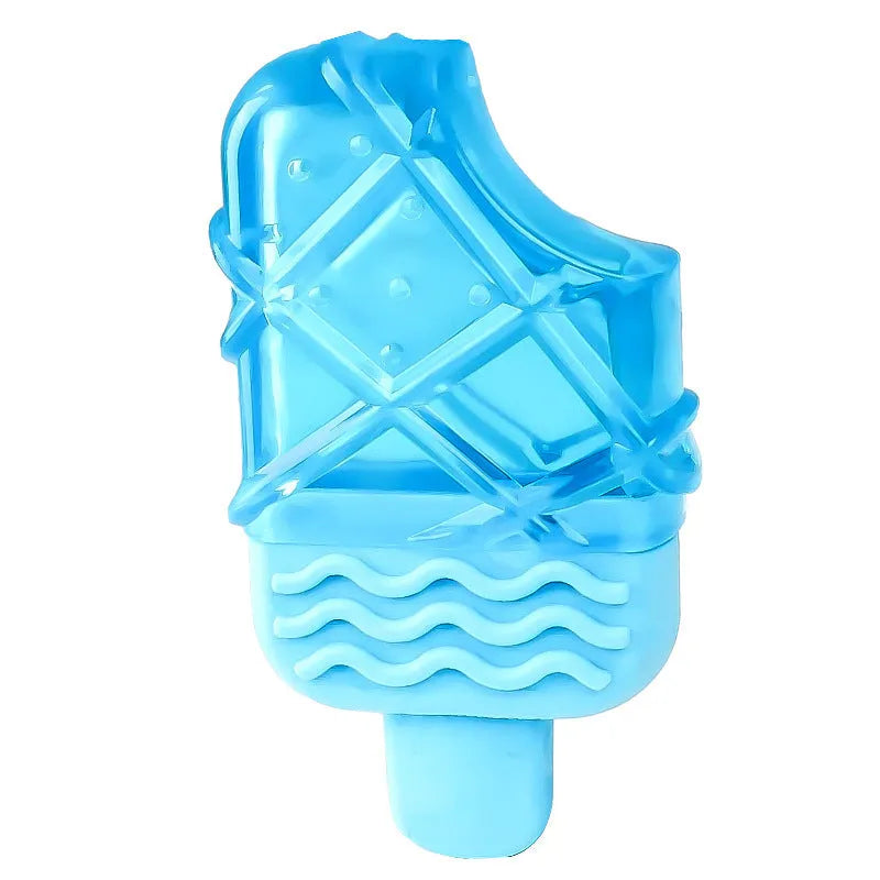 Set of three dog toys: a silicone pacifier, a freezable popsicle, and a silicone ring for cooling and chewing.