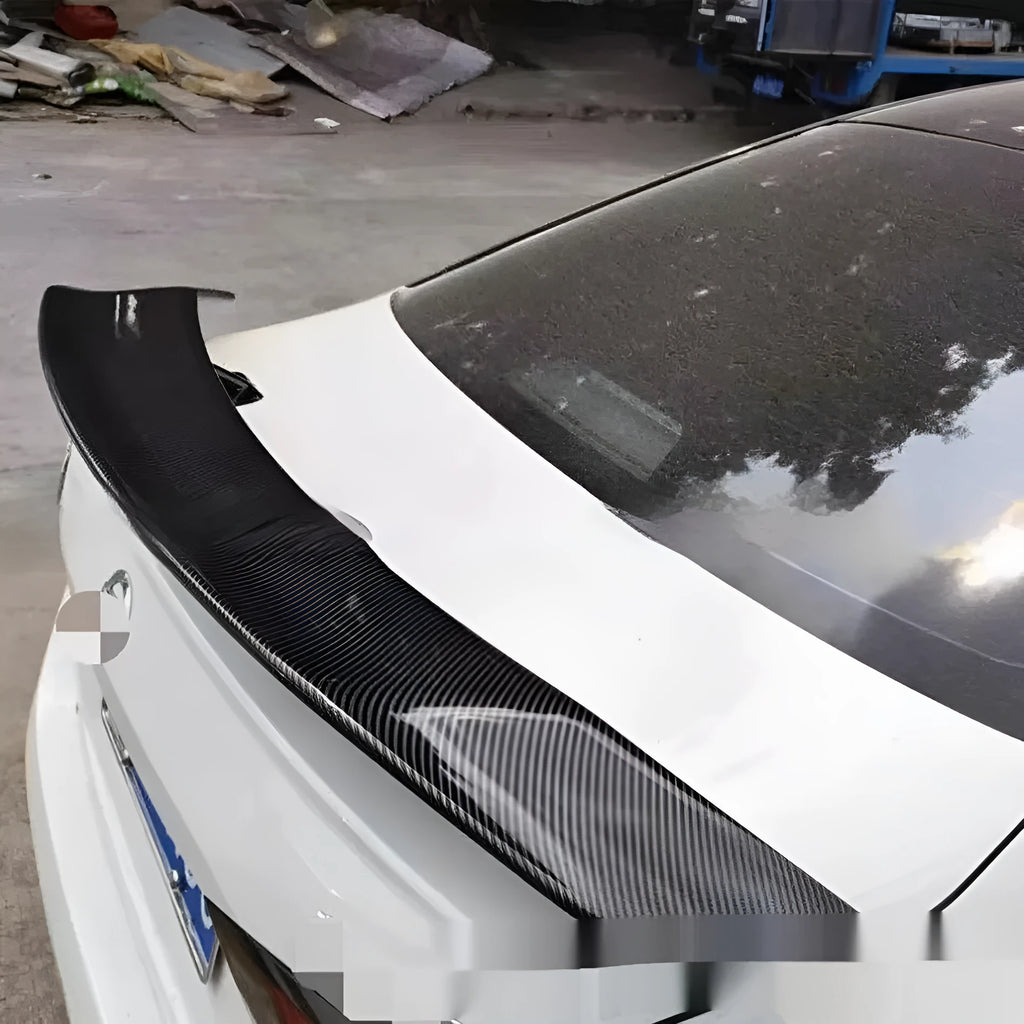 Universal punch-free ABS plastic car tail wing spoiler shown in carbon fibre pattern finish
