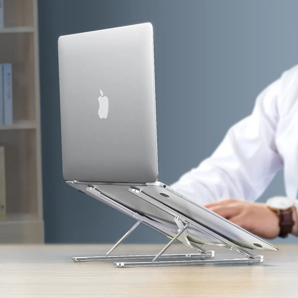 Portable aluminum laptop stand folded and unfolded, showing adjustable height and silver colour