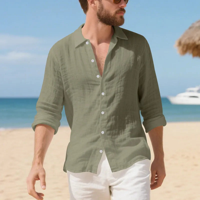 Man wearing a loose-fitting linen casual shirt in a light colour, showing the non-iron texture and American style.