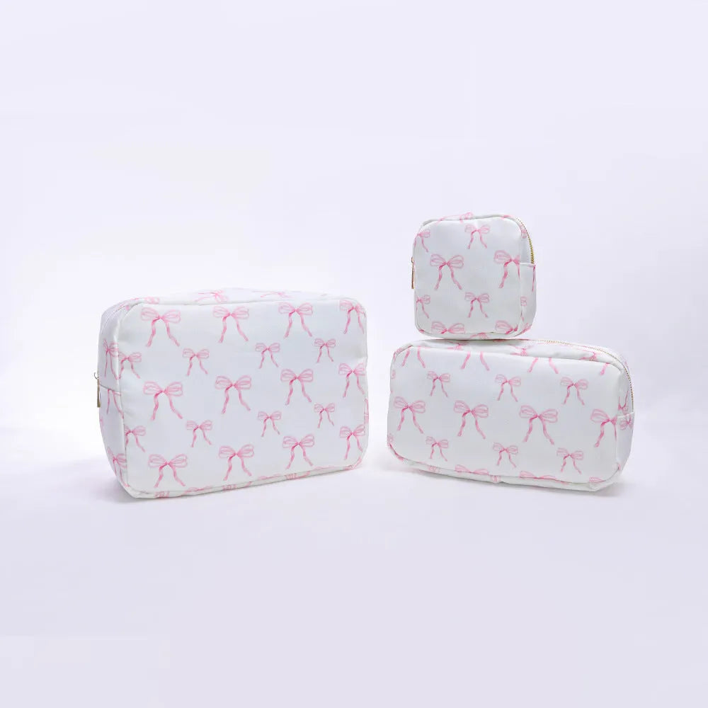Printed nylon cosmetic bag in blue with cartoon animation pattern, travel storage pouch