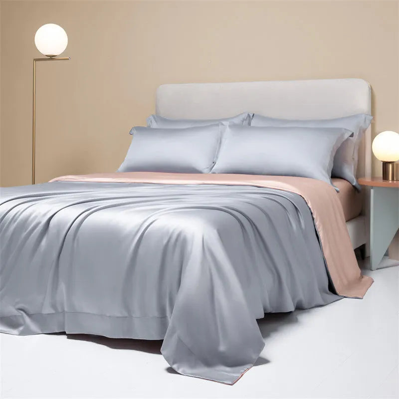 Luxury Tencel Lyocell bedding set with quilt cover, sheet, and pillowcases in grey.