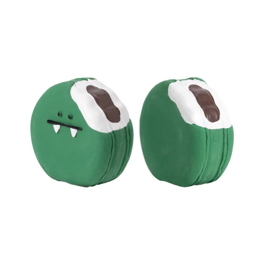 Yellow and green cartoon bread shaped latex dog squeaky chew toy on a white background.