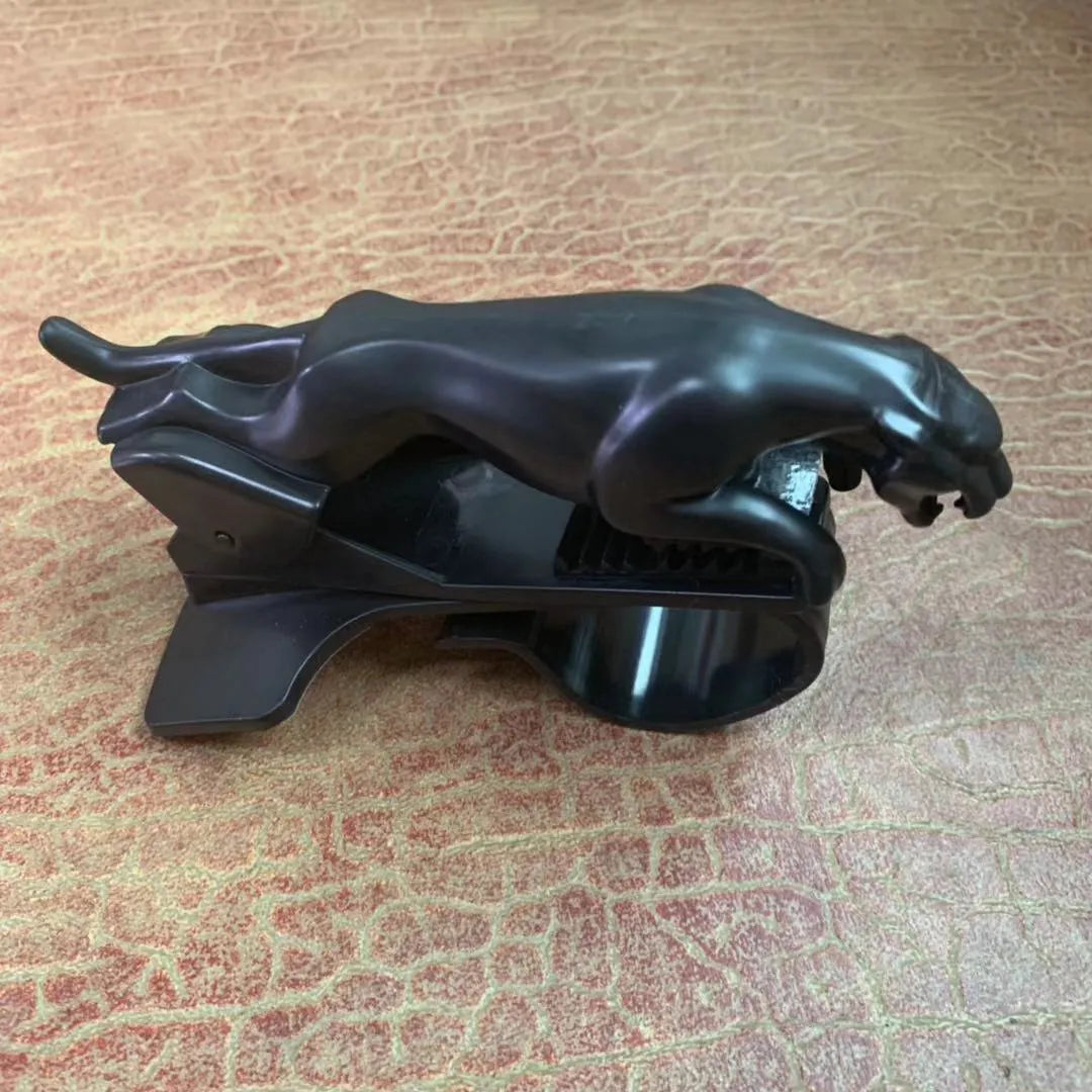 Car Leopard rotating mobile phone bracket in black ABS plastic mounted on dashboard