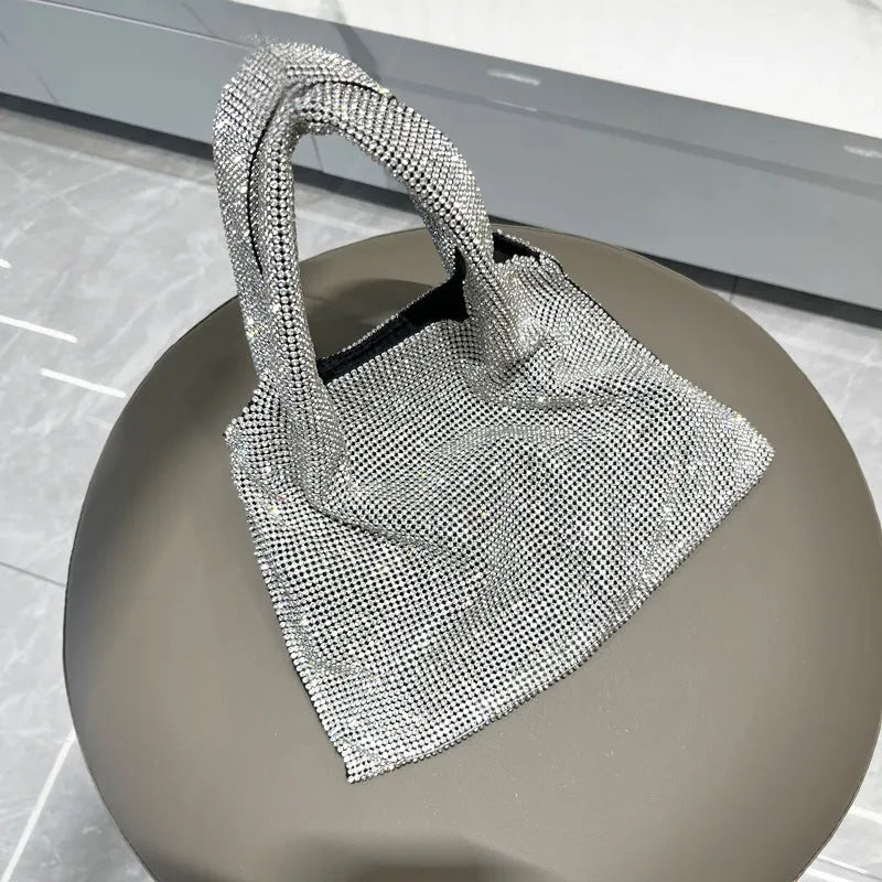 Shiny rhinestone handbag in silver colour, cotton thread construction, open pocket design for evening parties