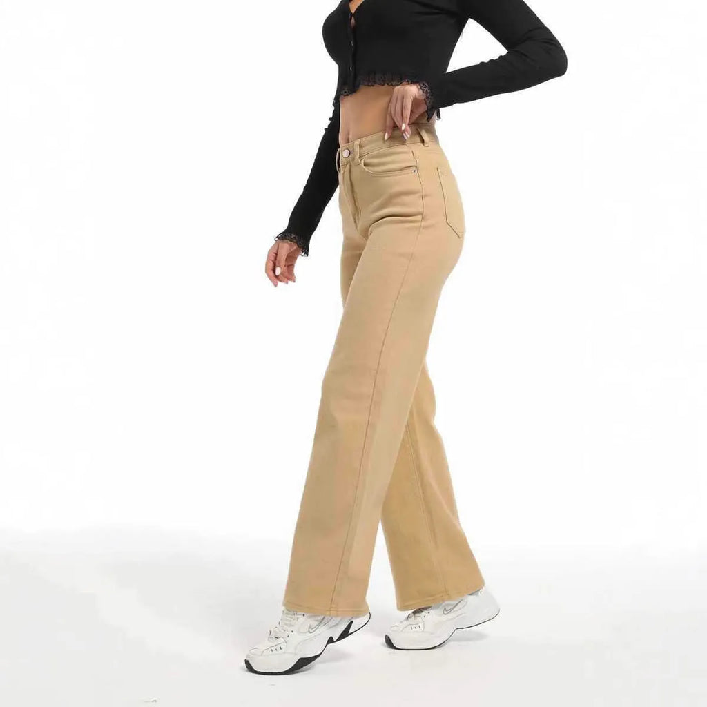 Women's apricot high-waist wide-leg cotton jeans laid flat showing straight leg cut.