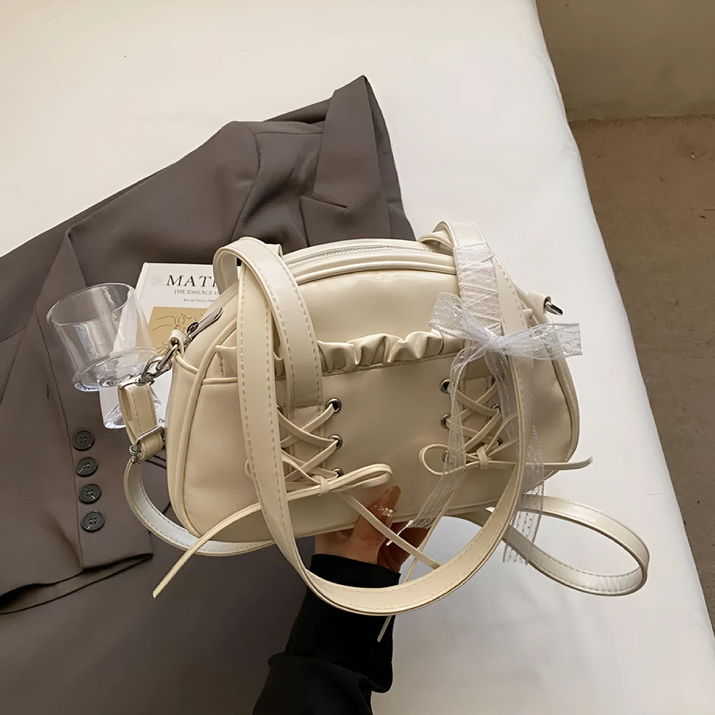 Women's bandage texture bow handbag in PU leather with shoulder strap and phone compartment