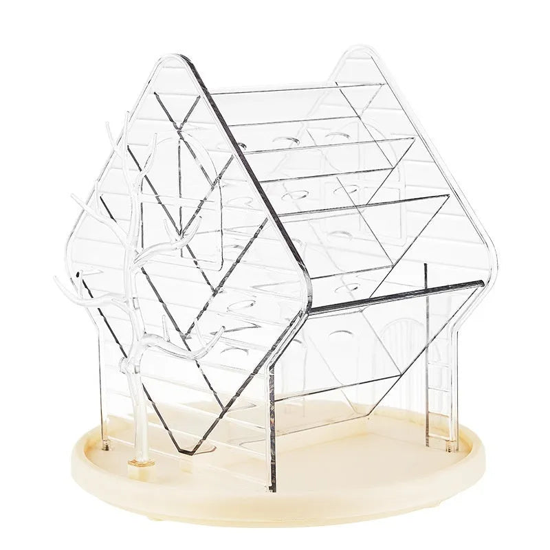 Clear and amber gold rotating plastic cosmetics storage box on a vanity