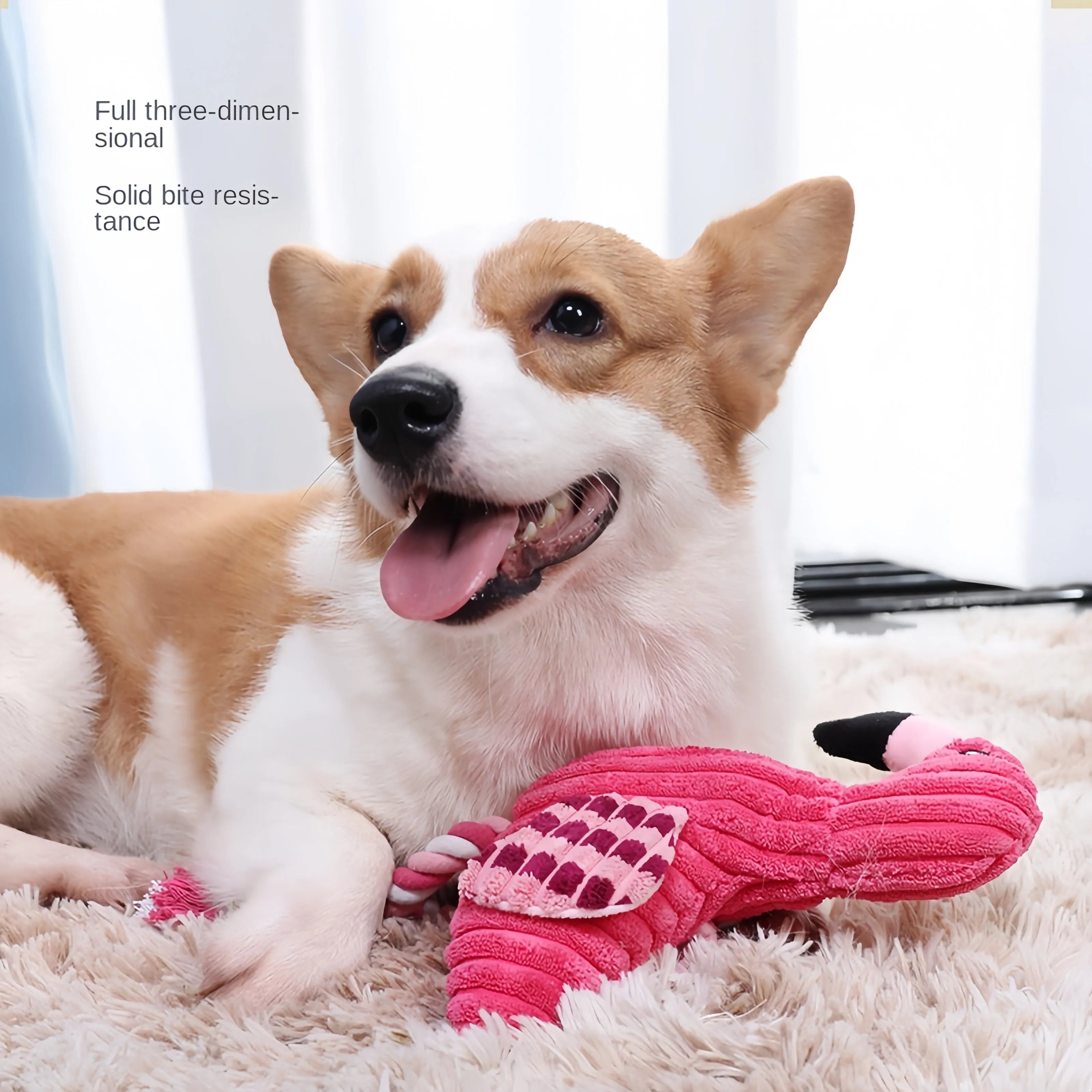 Pink animal-shaped corduroy plush dog toy with a squeaker.