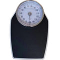 Black mechanical bathroom scale with large analogue dial showing weight measurements