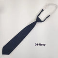 Men's navy blue cotton bow tie with arrow style on a plain background.