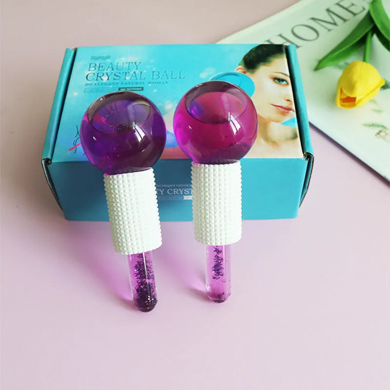 Set of two beauty ice wave ball face massage tools in purple flash finish on white background