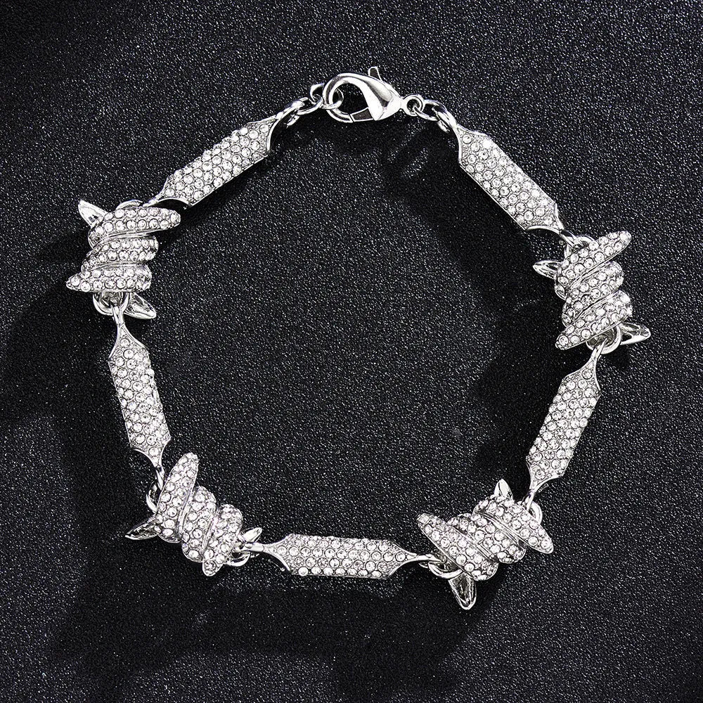 Irregular 3D solid alloy Cuban chain bracelet and necklace in silver and gold, unisex hip hop style, on dark background