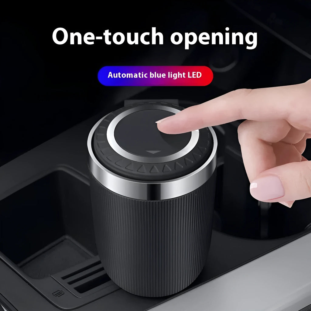 Metal ABS car ashtray with cover and blue LED light against a dark background