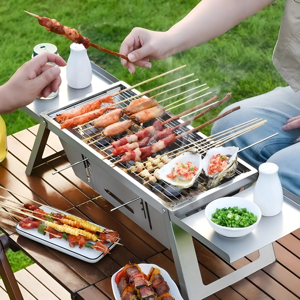 Small foldable portable charcoal grill showing compact folded design for outdoor cooking