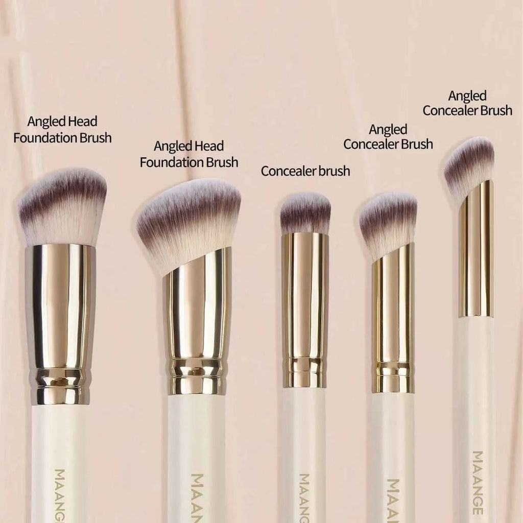 Five apricot coloured makeup brushes including angled blush brush for contouring