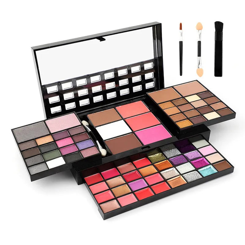 74 colour makeup palette with four layers showing eyeshadows, lip glosses, blush and contour powders with brush set