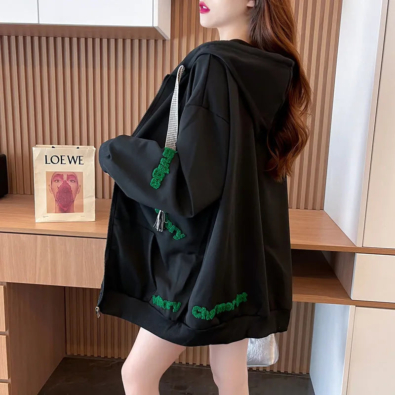Loose large letter hooded cardigan coat for women in apricot with black lettering, long sleeves, and relaxed fit