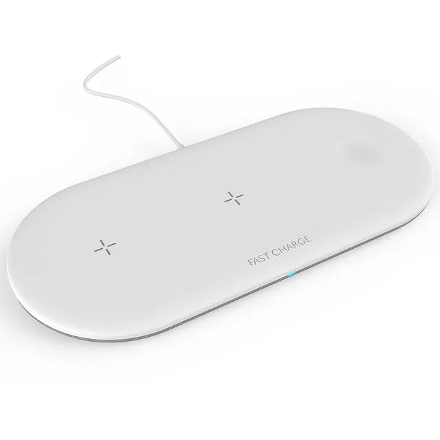 Black three-in-one wireless charging station for iPhone, Apple Watch, and headphones on a desk