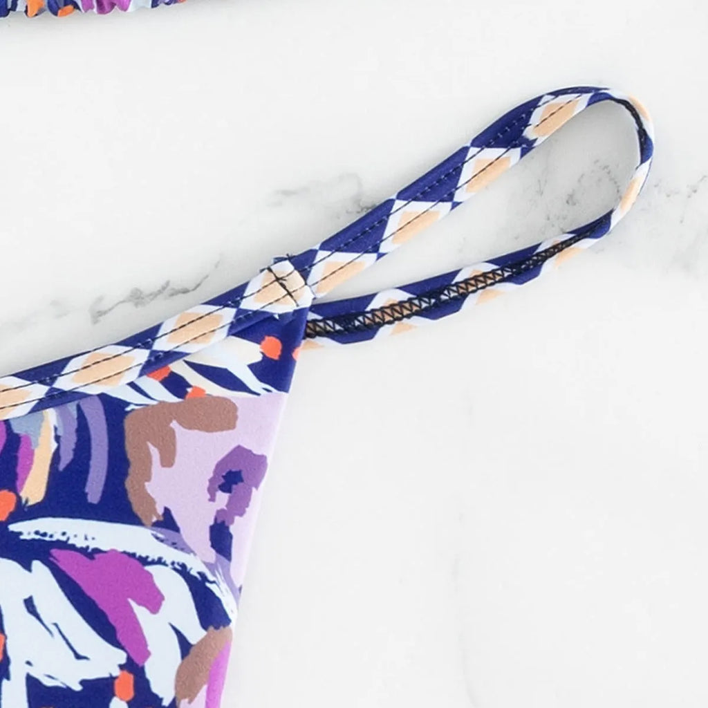 Women's floral printed swimsuit with triangle bag design in briefs style