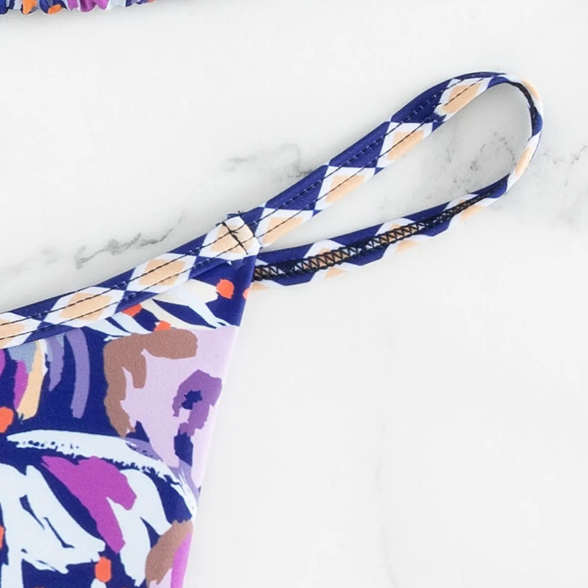 Women's floral printed swimsuit with triangle bag design in briefs style