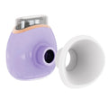 White and purple household eye humidifier with USB charging cable on wooden surface