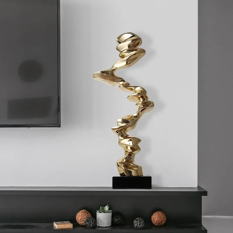 Modern abstract still life ornament made from plastic and natural resin in bright gold, silver, or blue
