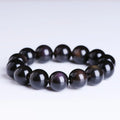 Natural icy obsidian Pi Xiu bracelet with double-eye ice stone colour on a geometric bead design.