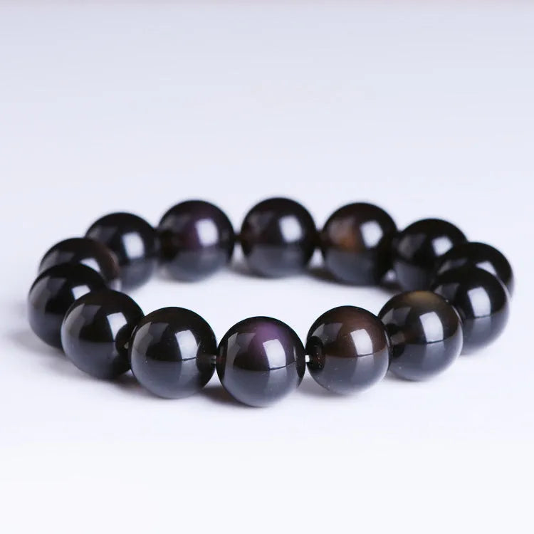 Natural icy obsidian Pi Xiu bracelet with double-eye ice stone colour on a geometric bead design.