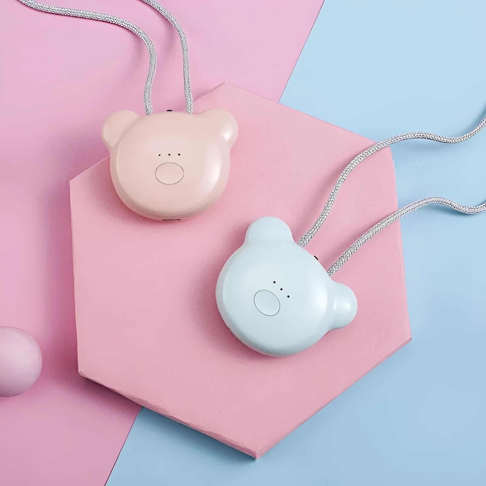 Mini USB portable air purifier necklace worn as a collar, showing pink and blue colour options.