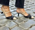 Women's apricot black colour block pointed toe sandals with buckle and stiletto heel.