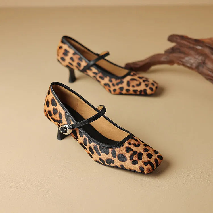 Women's black square toe stiletto ankle-strap heels with a horse hair upper and buckle closure.