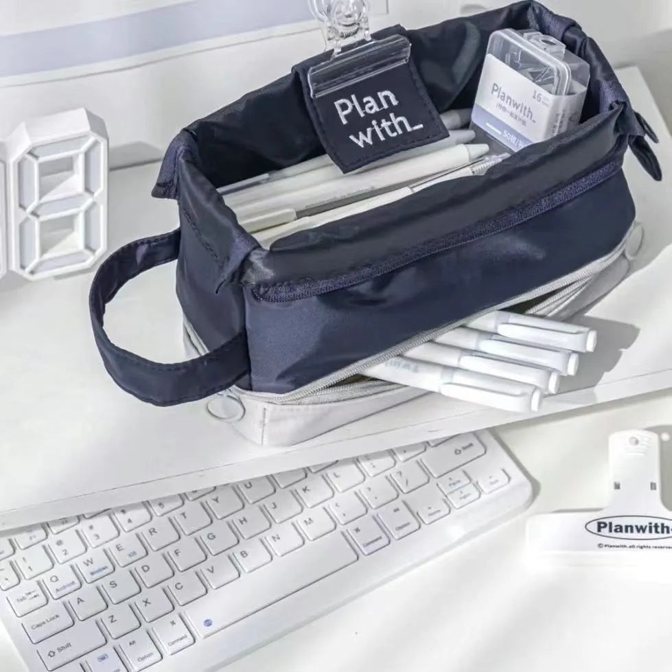 Folding double layer student pencil case in polyester fabric, shown in dark blue colour.