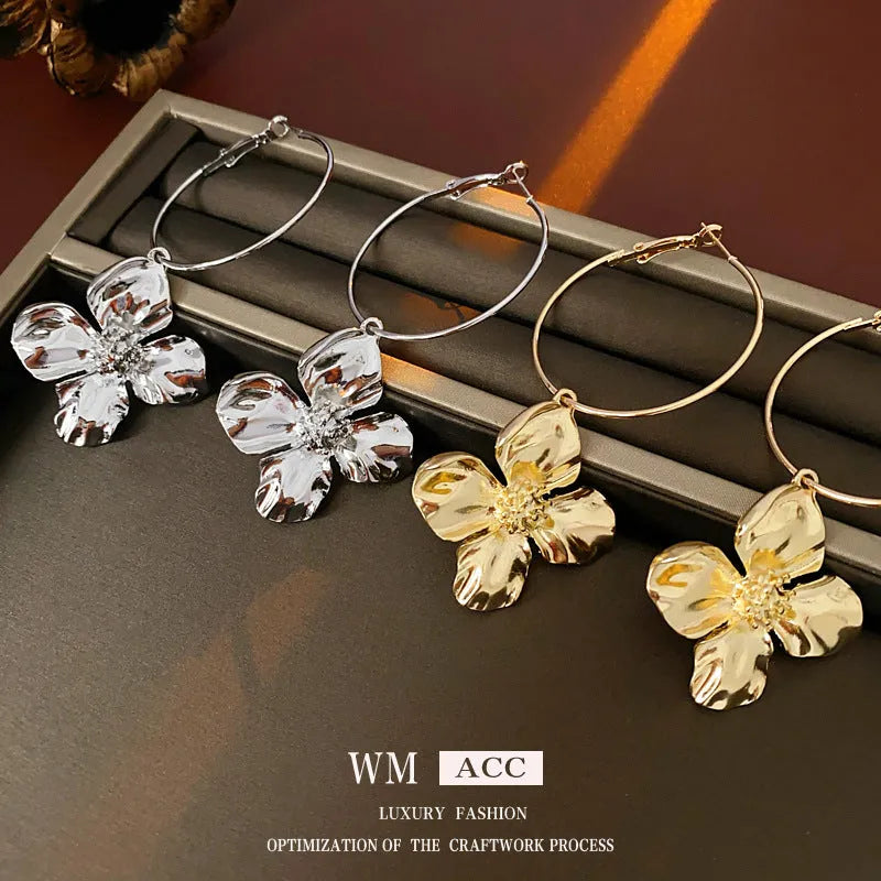 Silver needle metal flower earrings with geometric design in gold and silver electroplated finish