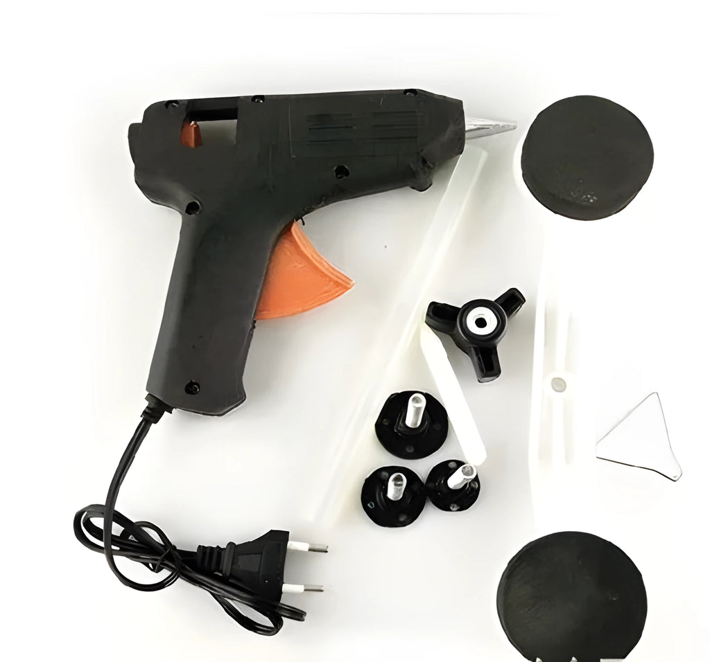 Car dent repair tool with glue gun and three traction gasket strips in color box packaging