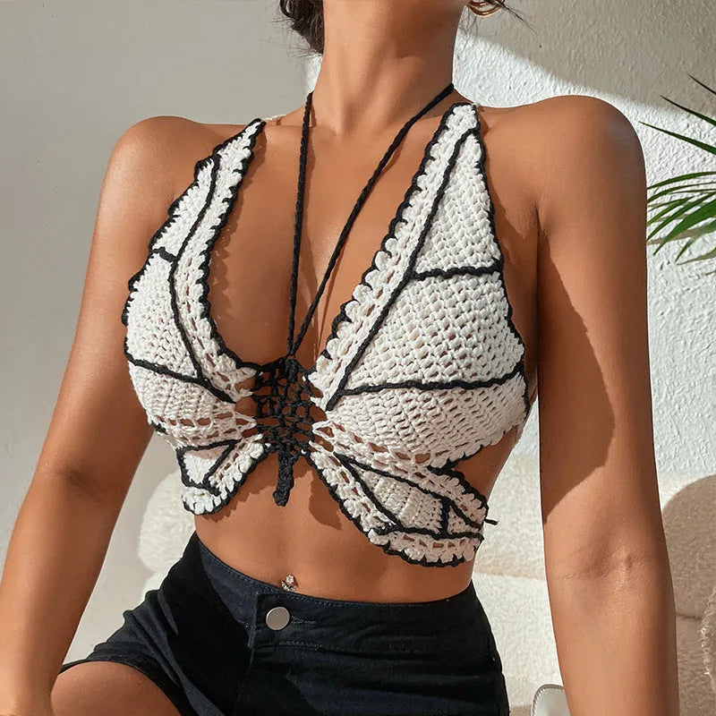 Women's black and white classic style bikini swimsuit made from acrylic fabric.