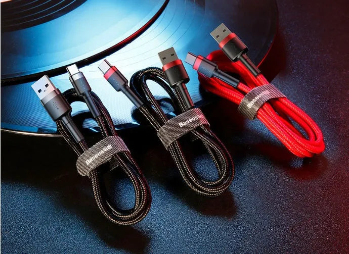 Close-up of a woven grey and black Android micro USB charging and data cable with a choice of lengths.