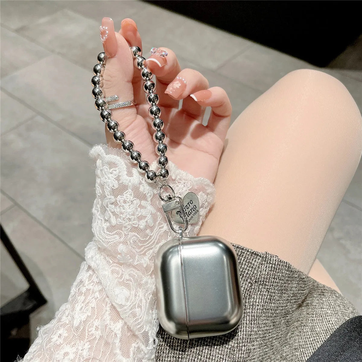 Matte plating TPU protective cover case for Apple AirPods shown in electroplated finish