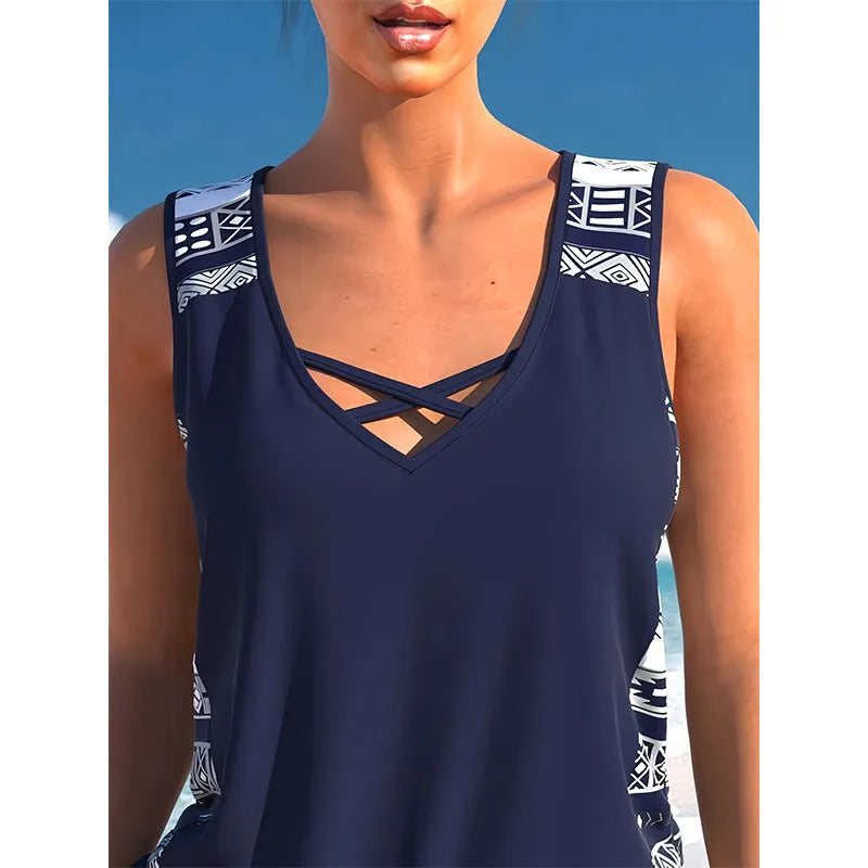 Women's polyester sleeveless conservative split swimsuit with hollow detailing in split swimsuit colour, available in sizes S M L XL XXL