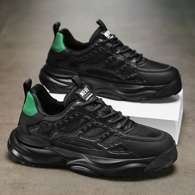 Men's solid colour casual shoes with breathable PU mesh upper and round toe in black and white.