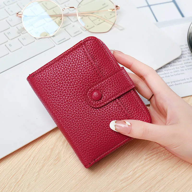Ladies short wallet with lychee pattern texture in PU leather showing 2-fold design